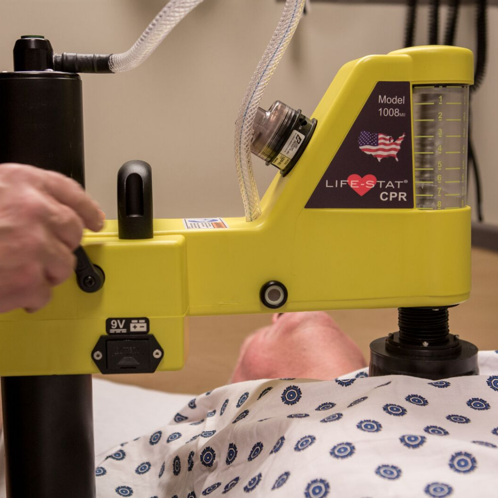 11 life-stat mechanical CPR machine on adult