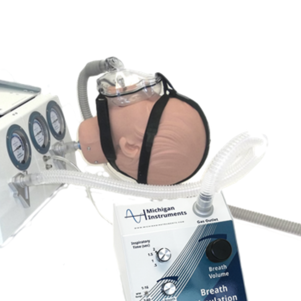 11 close up of adult test dummy head with mask on attached to test lung simulator and breath simulation module machine